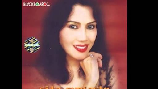 Download Mp3 Rita Sugiarto