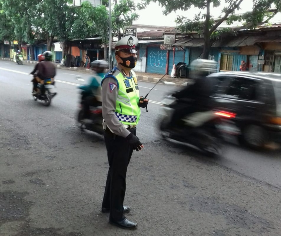 Polsek Cibeunying Kidul  Laksanakan Pelayanan Masyarakat Pengaturan Lalulintas