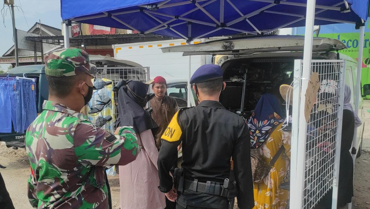 Patroli Himbauan Prokes Sinergitas Dengan Unsur TNI Di Pasar Tegal Gubuk
