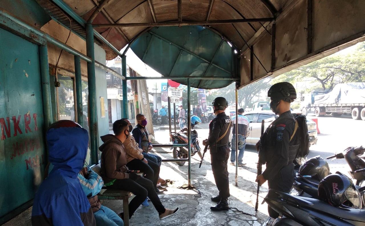 Ajak Warga Terapkan Prokes, Brimob Jabar Patroli Ke Daerah Jatinangor