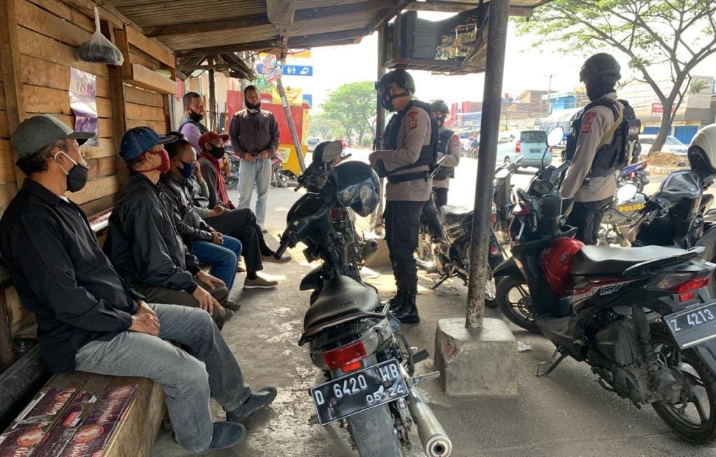 Brimob Jabar Ajak Para Ojek Terapkan Prokes Di Masa Pandemi